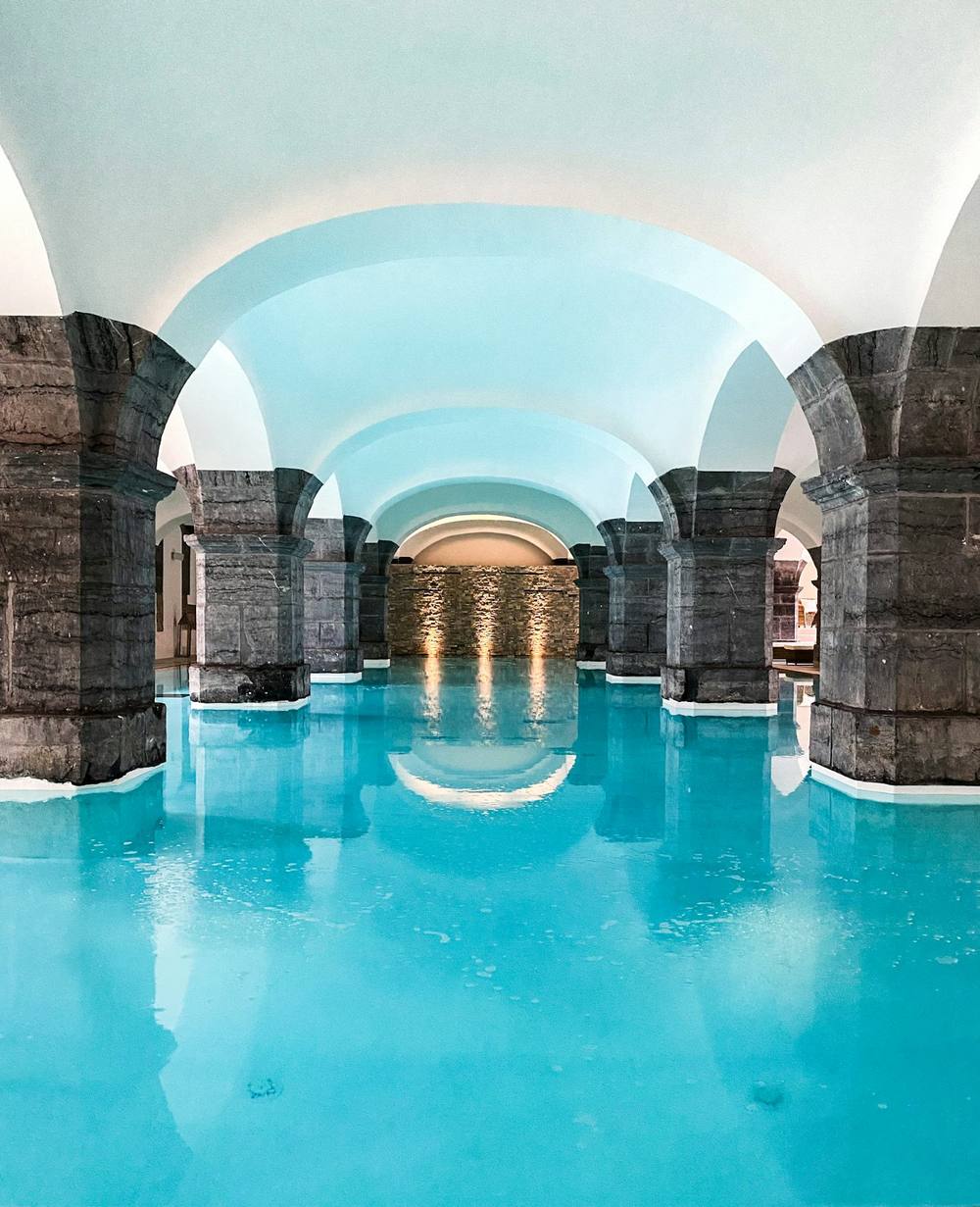 Pool under stone vaults with turquoise water